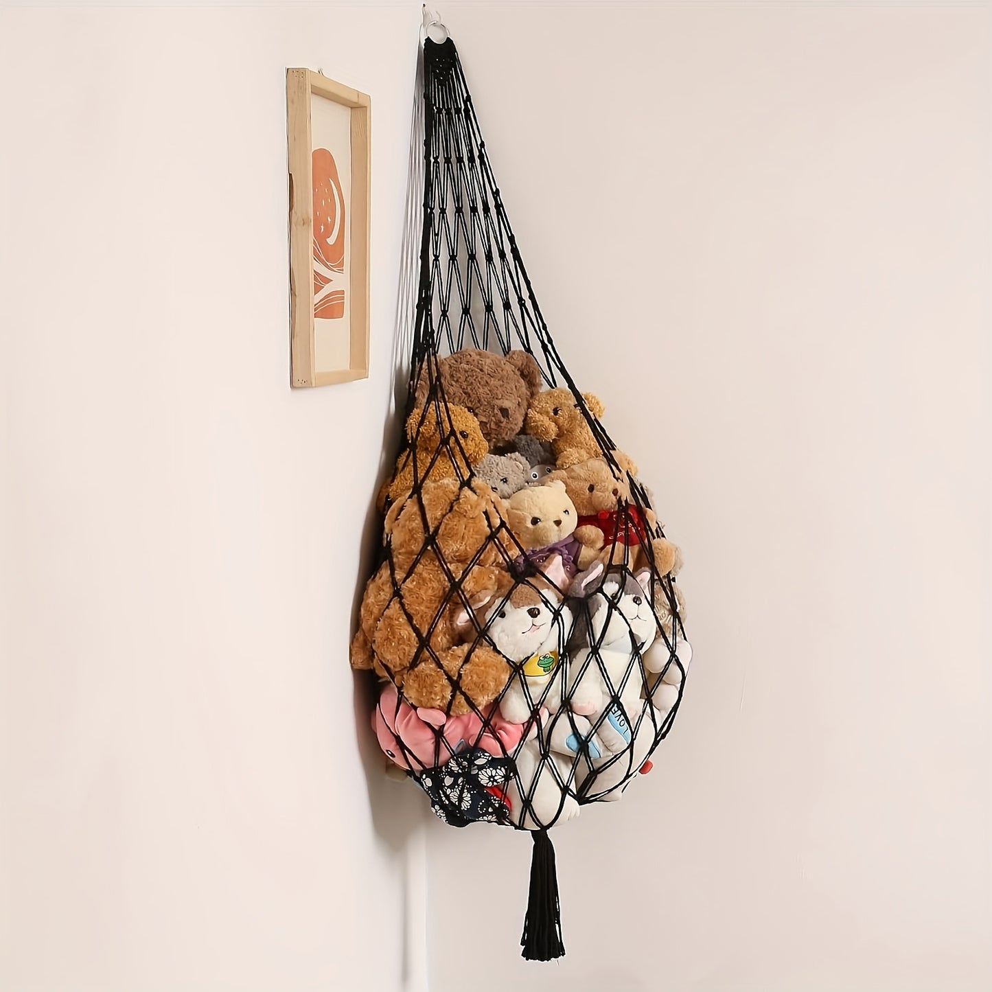 Plush toy storage hammock for kids' rooms, easy to install, holds multiple toys.