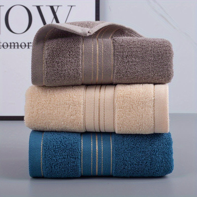 High-quality 100% cotton hand towels with modern striped pattern, 500 GSM, and super absorbent knit fabric. Suitable for bathroom, face, and hair. Perfect for home, hotel souvenirs, and holiday gifts.