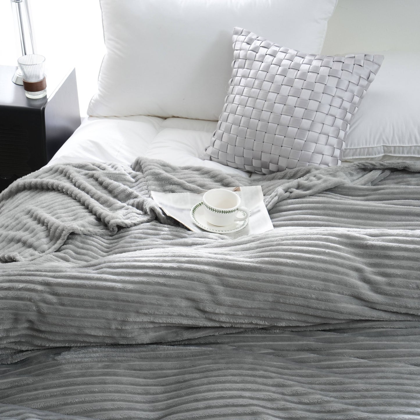 Enjoy the cozy comfort of our 1 piece 220GSM Flannel Throw Blanket, featuring a soft and warm ribbed design available in Beige, Gray, Black, or White. Perfect for all seasons, this blanket is ideal for use in the bedroom, sofa, office, or even for your