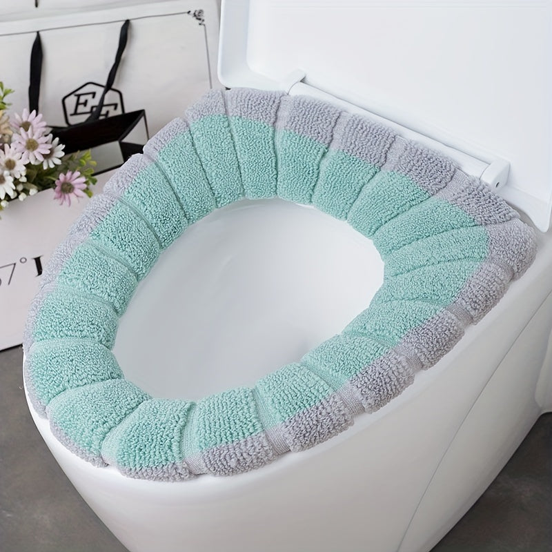 Soft and colorful toilet seat cover for winter warmth, ideal for home and dorm use, made of easy-clean polyester.