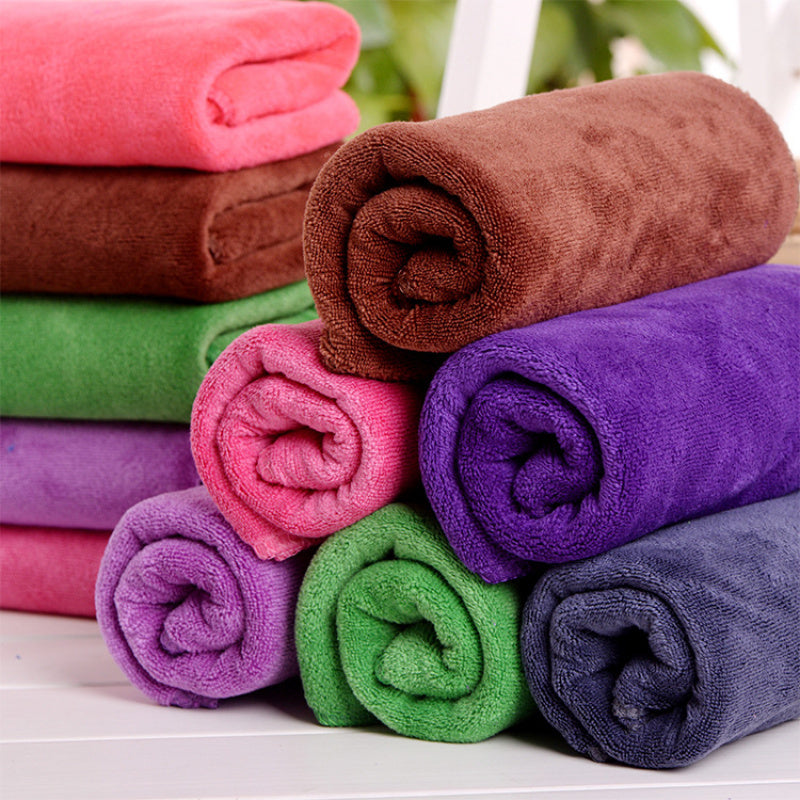 Soft microfiber towel perfect for camping, sports, swimming, and travel - dries quickly and absorbs well.