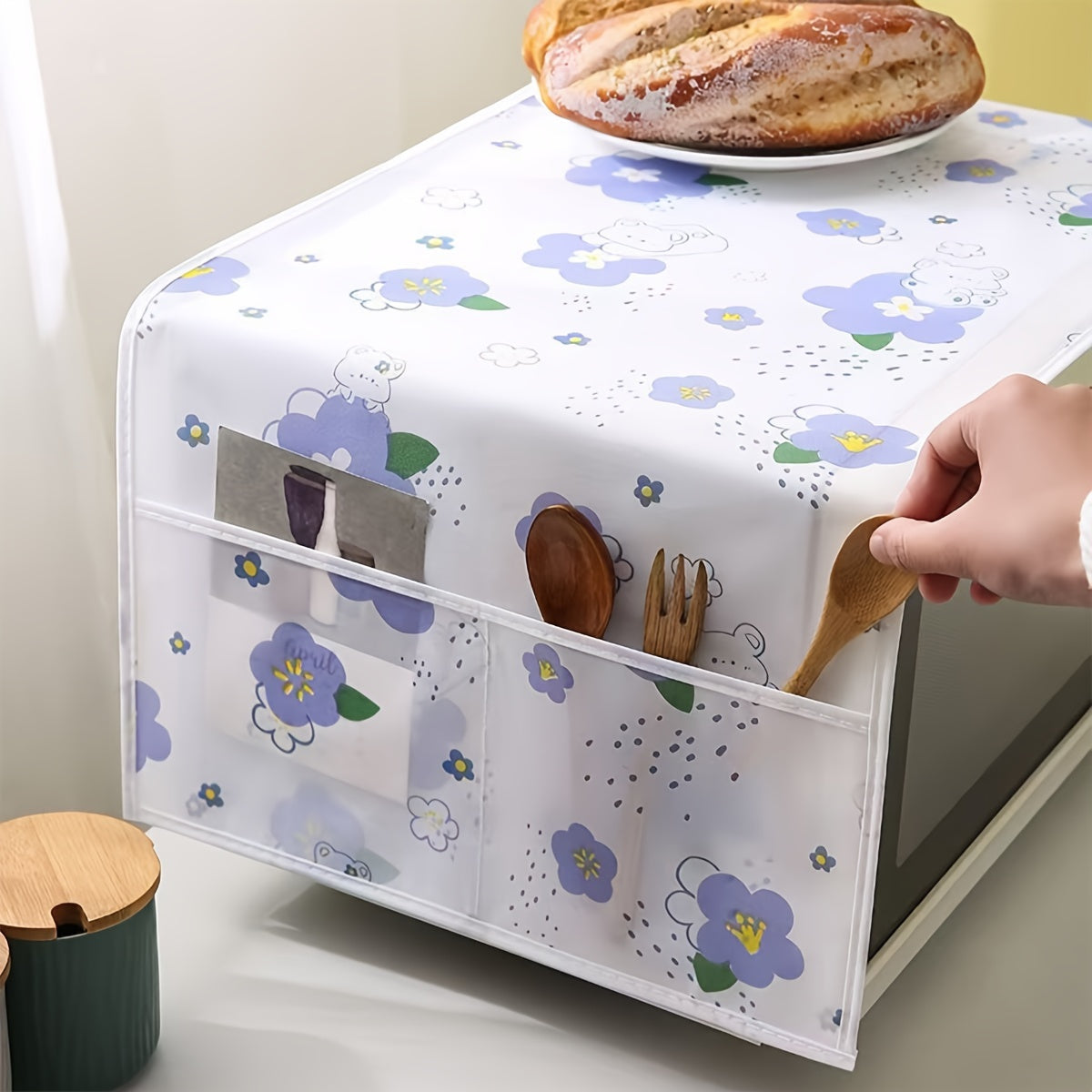 Waterproof and Oil-Resistant PVC Microwave Oven Dust Cover, Designed for Easy Storage and Kitchen Organization.