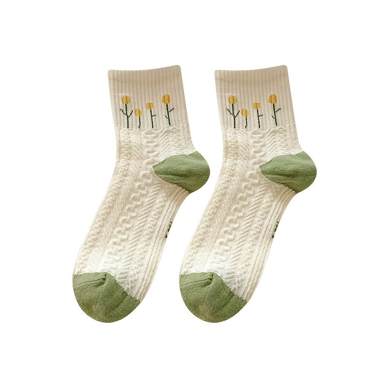 Five pairs of mid-calf socks for women with floral patterns.