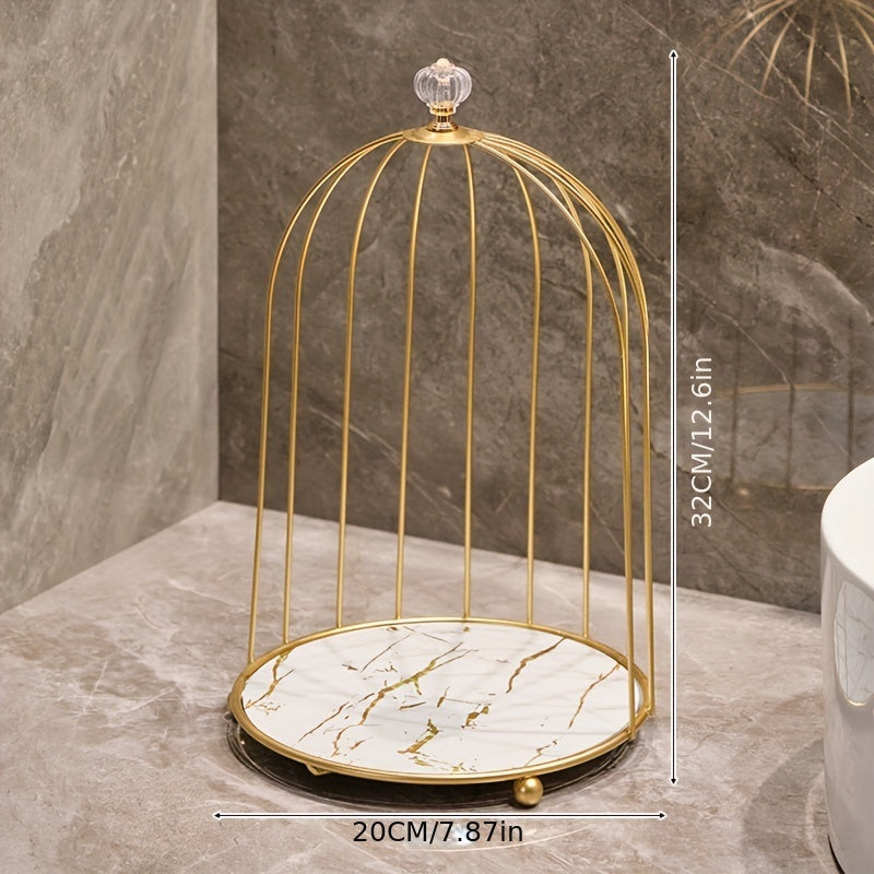 Luxury gold-toned cast iron makeup organizer with cage-shaped bathroom shelf for elegant display of perfumes and skincare products on vanity or countertop.