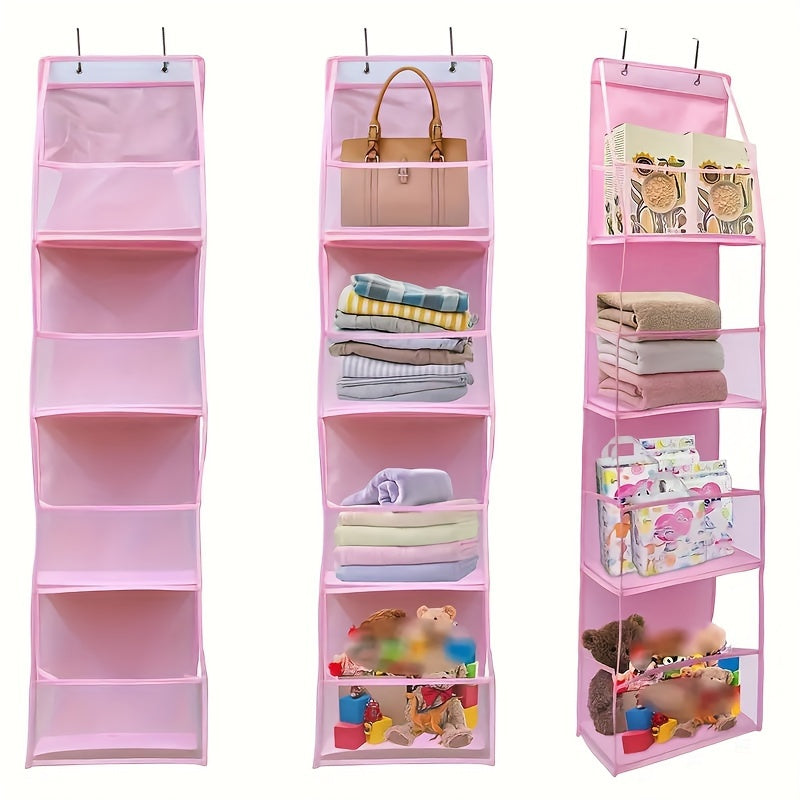 A fabric organizer in pink, designed to be mounted on a door and featuring four pockets. This versatile storage rack can be used in wardrobes, bathrooms, bedrooms, or dormitories. It includes a transparent window and a reinforced rack, along with two