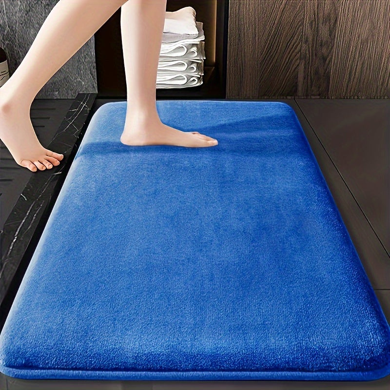 Soft coral fleece bath mat - absorbent, non-slip, washable rug for bathtub & shower, premium comfort accessory.