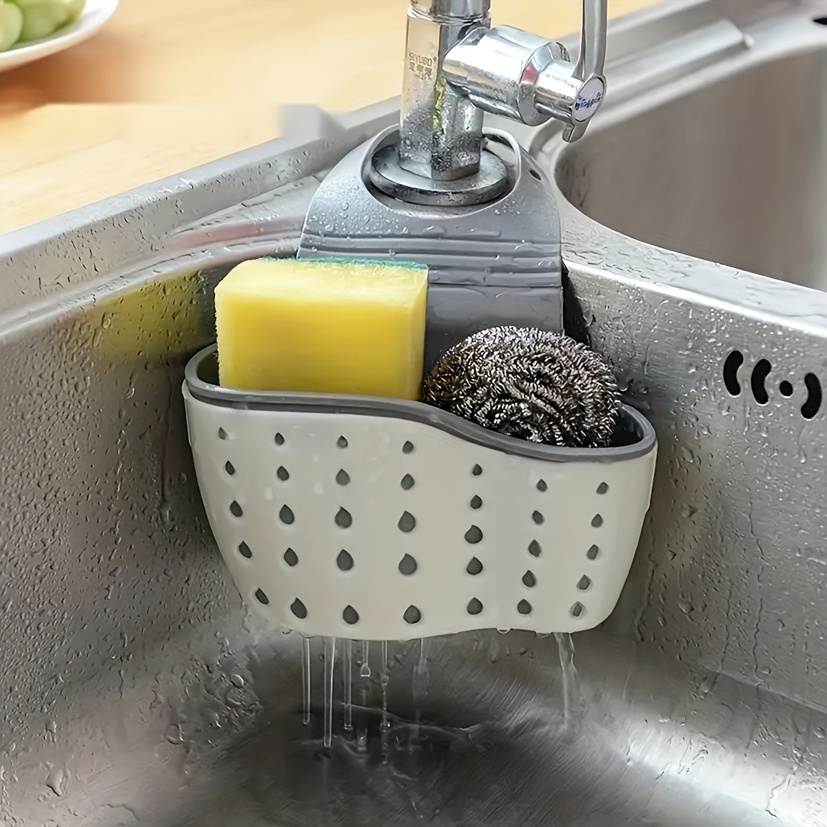 Kitchen sink drain basket, sink rack, hanging multi-functional retractable cutlery rack, plastic fruit and vegetable basket, drying rack, soap sponge holder, and other kitchen supplies.