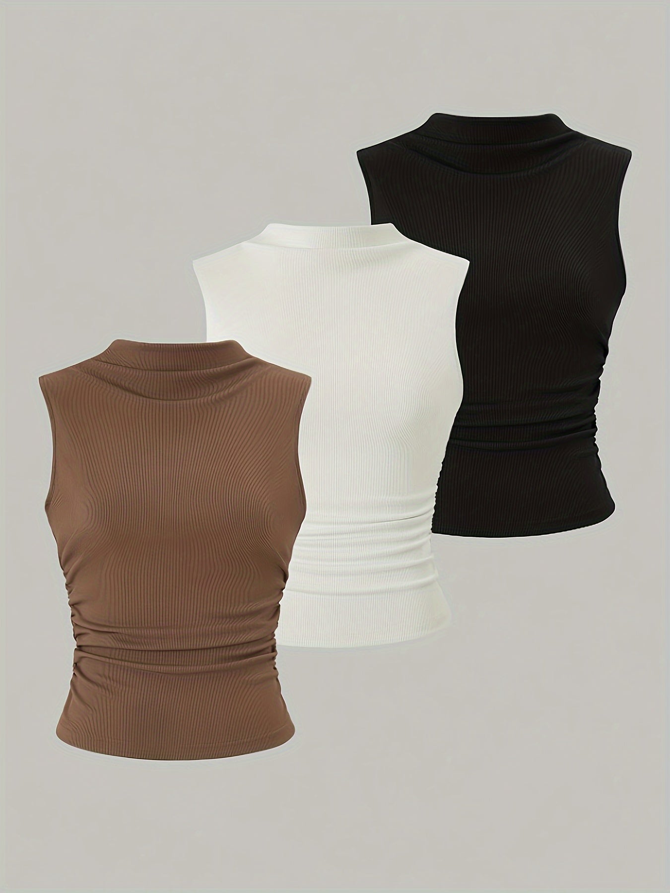 Sleeveless mock neck tank top features chic ruched design, stretchy polyester blend, machine washable - versatile slim vest for all seasons.