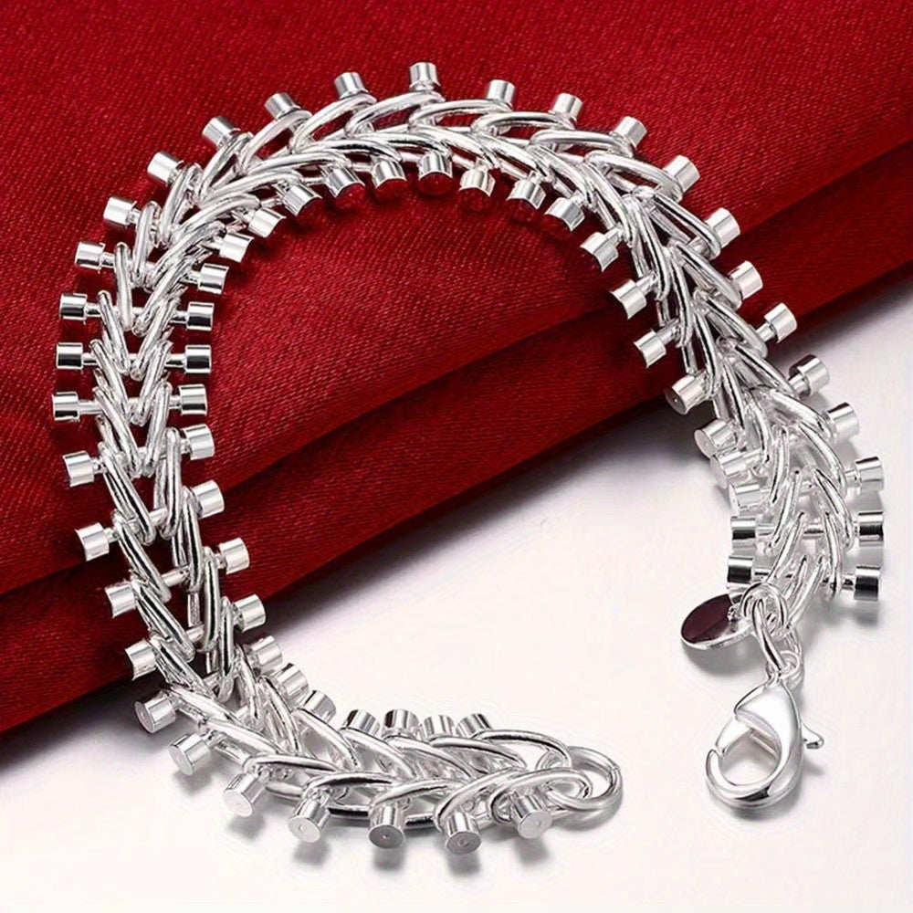 This bracelet is made of high-quality S925 sterling silver featuring a double bead chain design. It is beautifully crafted with exquisite silver detailing, embodying a fashionable retro style. This versatile piece is perfect for everyday wear or special