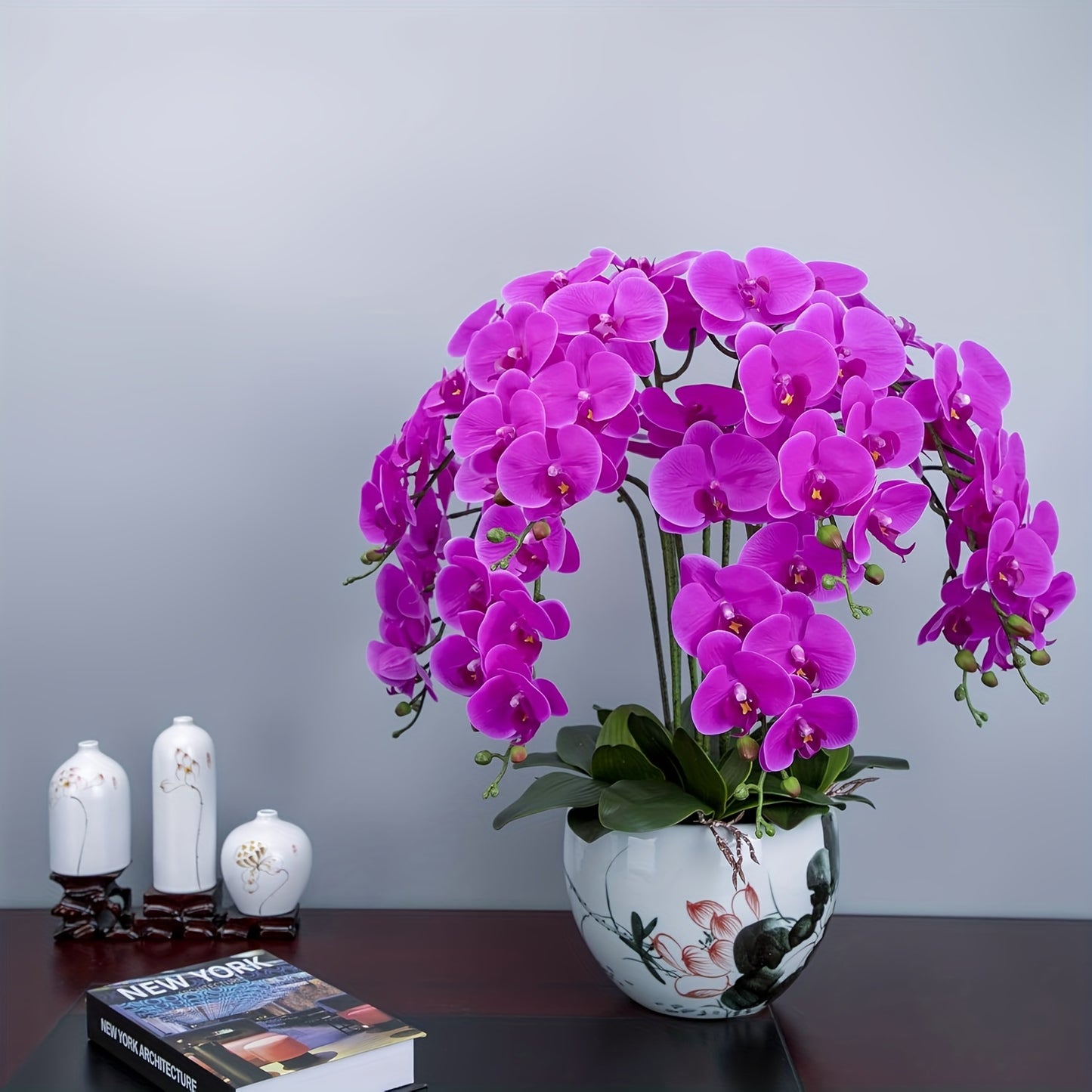 68.58cm vibrant purple red latex orchid with long stem. Perfect for weddings, home decor, and parties. Ideal for high vases, tabletops, and seasonal displays. Great decorative accessory.