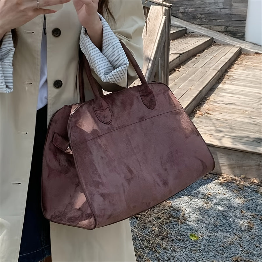 Elegant faux leather top-handle bag for women with fixed shoulder straps, buckle closure, and polyester lining. Solid color office tote, no embellishment, from Guangzhou.