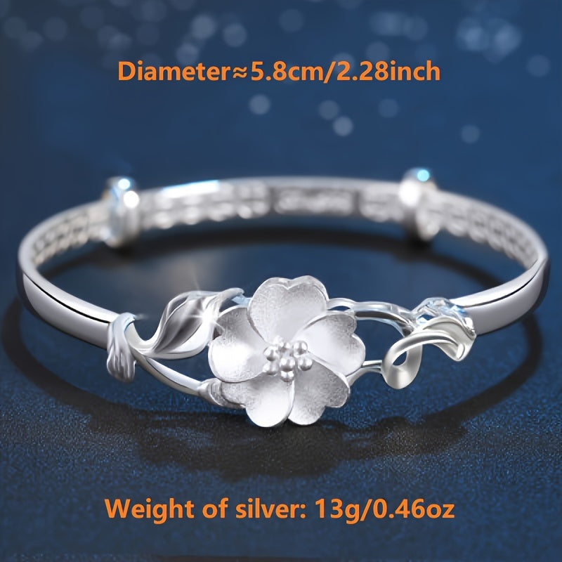 Sterling Silver Flower Bracelet made from S999 silver, features an adjustable design that is both fashionable and versatile. This noble fashion bracelet is a perfect gift for lovers, mothers, daughters, and as party, Valentine's Day, or Christmas gifts.