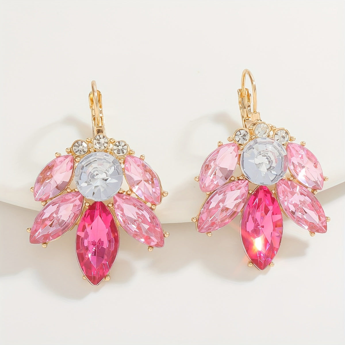 Shimmering pink floral and leaf earrings adorned with rhinestones - chic fashion accessory, made of gold-tone zinc alloy with stainless steel posts, perfect Valentine's Day gift for your girlfriend, suitable for all occasions and seasons.