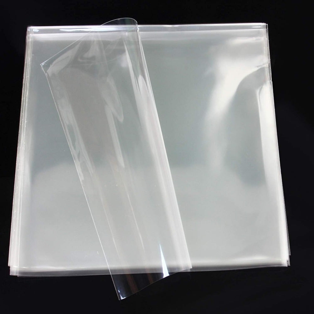 50/100 transparent plastic LP record sleeves for vinyl albums, uncharged protective covers. Single and double sleeve set with additional plastic material.