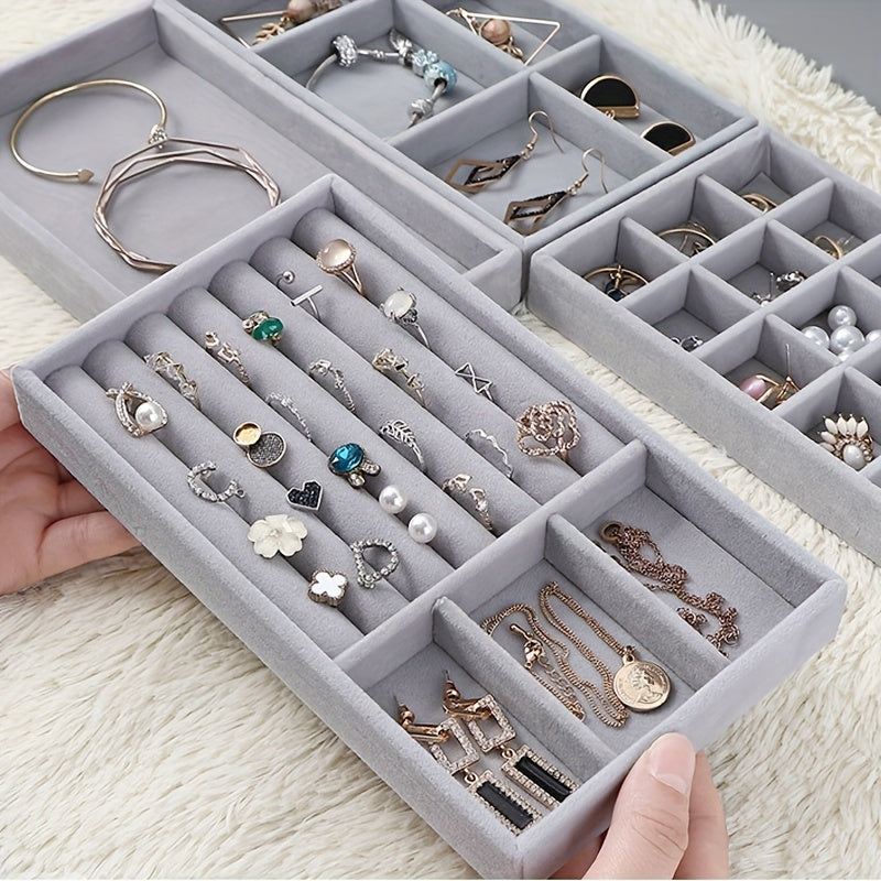 Velvet jewelry tray, display stand, and stackable storage box for earrings, rings, and necklaces.