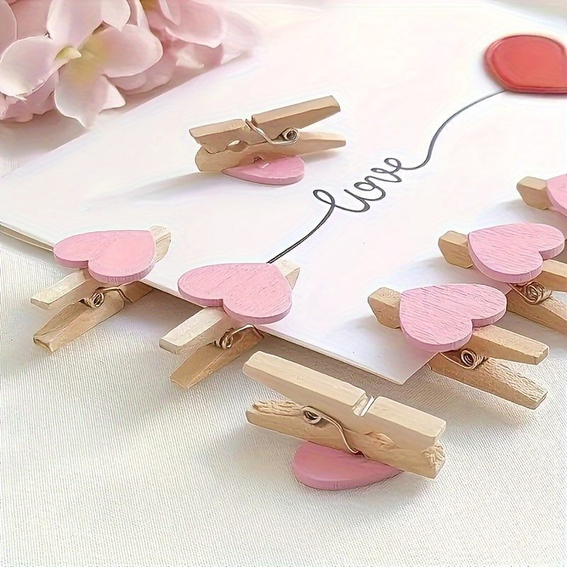 25 red heart wooden clothespin clips for photos, paper, or postcards, ideal for home decor or wedding stationery.