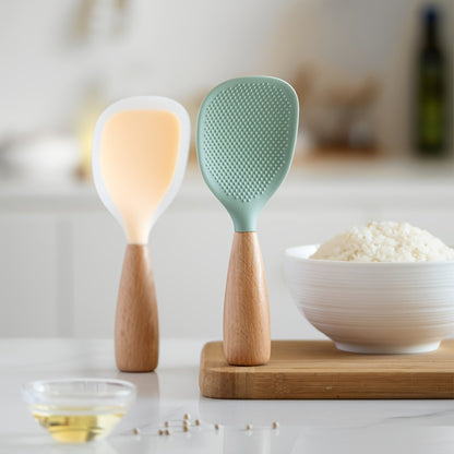 Heat resistant silicone spoon with wooden handle for non-slip rice cooker. Practical kitchen tool for home, school, and dorm.