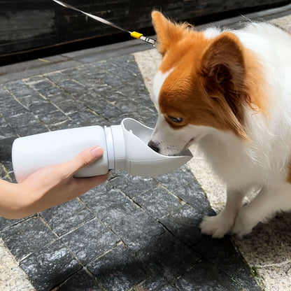 Portable dog water bottle with soft silicone foldable drinking dispenser and feeder bowl. Easy to clean and leak-proof design.