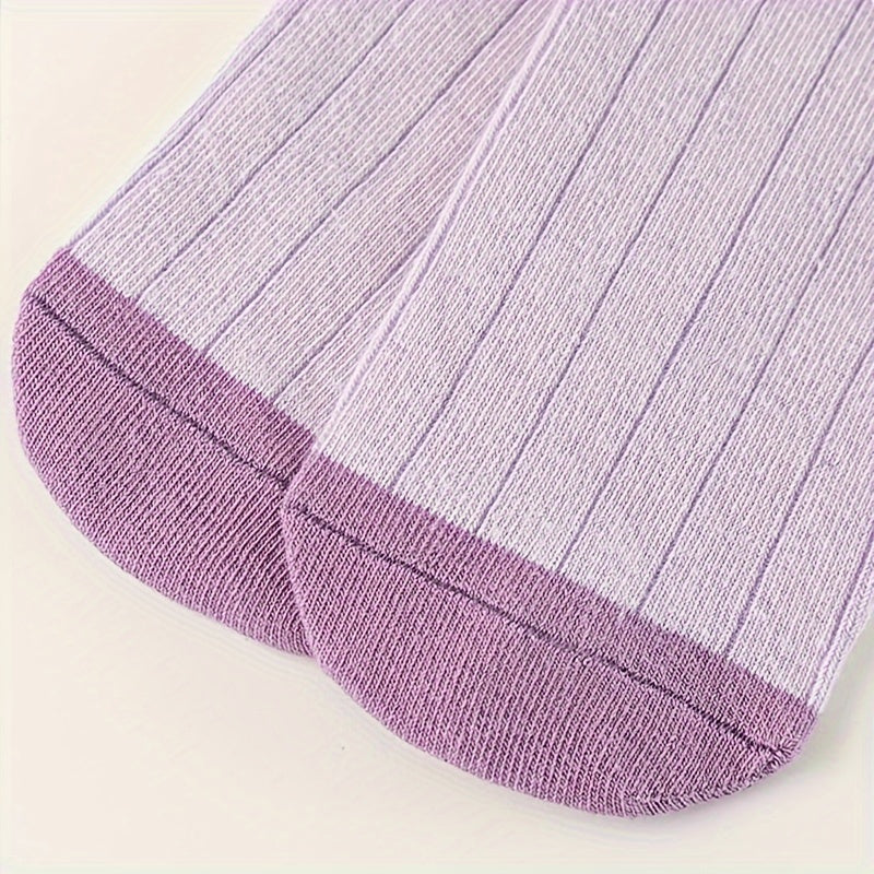 Sanrio Double Kulomi socks in purple with love bow pattern.