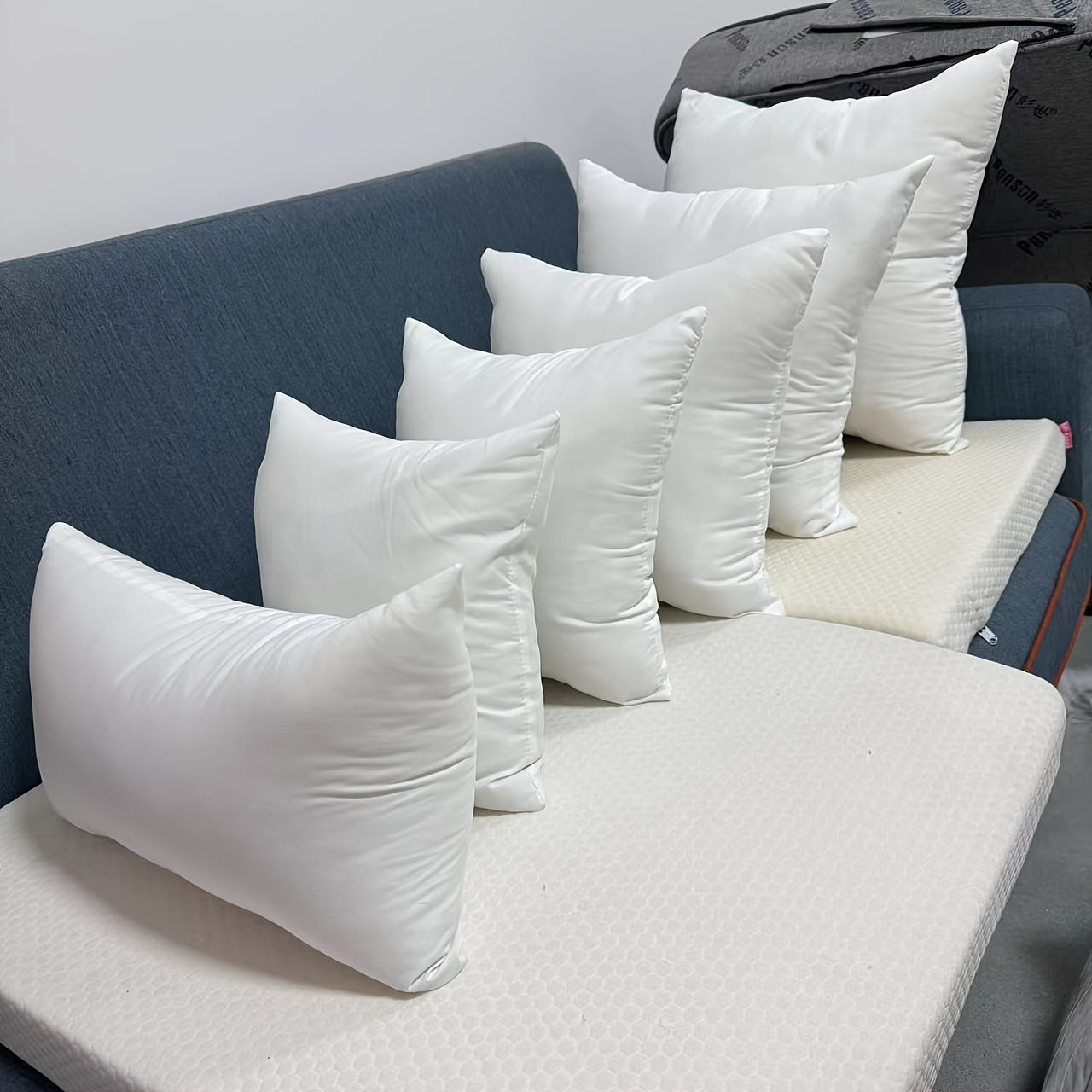 Set of four traditional white throw pillow inserts, featuring high resilience for a comfortable and stylish addition to your sofa, car, or bedroom décor