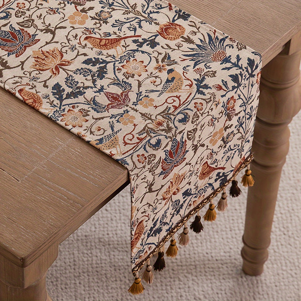 Vintage floral and bird jacquard table runner with tassels in rustic countryside style. Made of polyester, 33cm wide. Ideal for dining, coffee, and tea tables. Vintage design with polyester fabric.