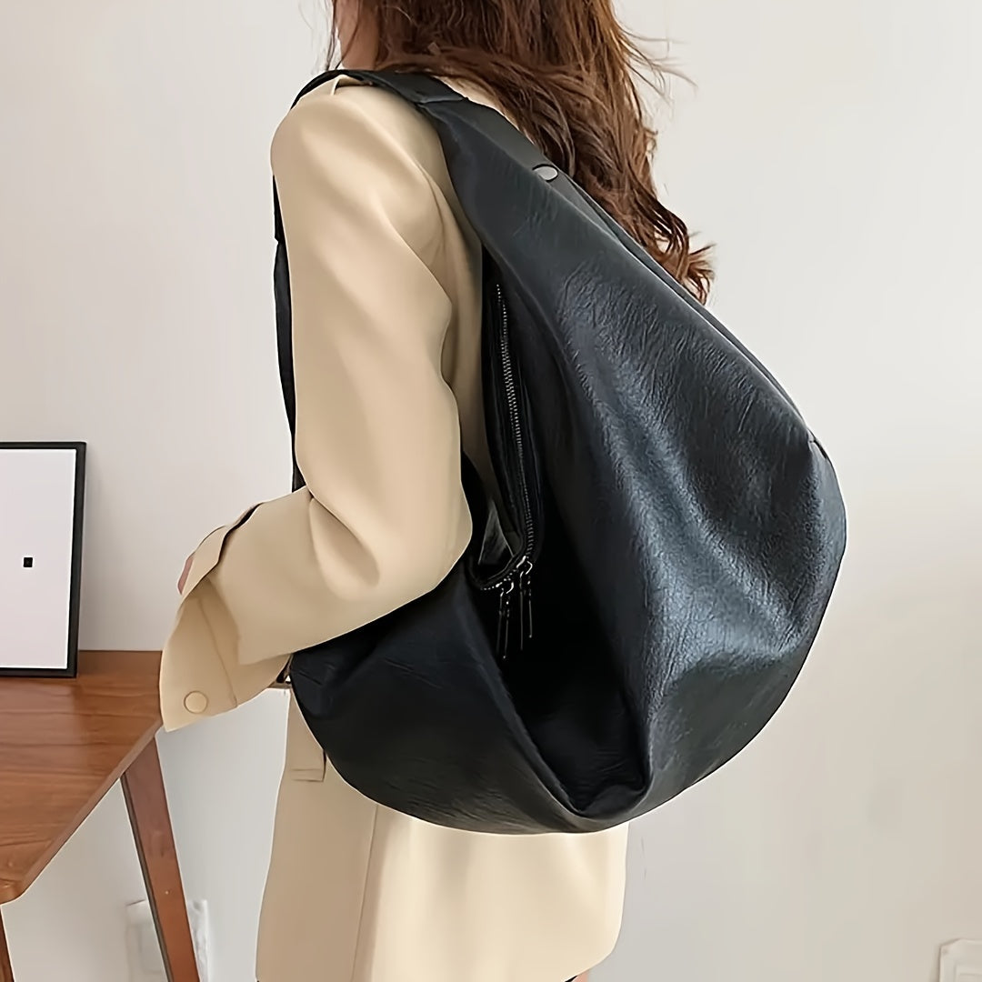 Fashionable vegan hobo bag with large capacity for women.