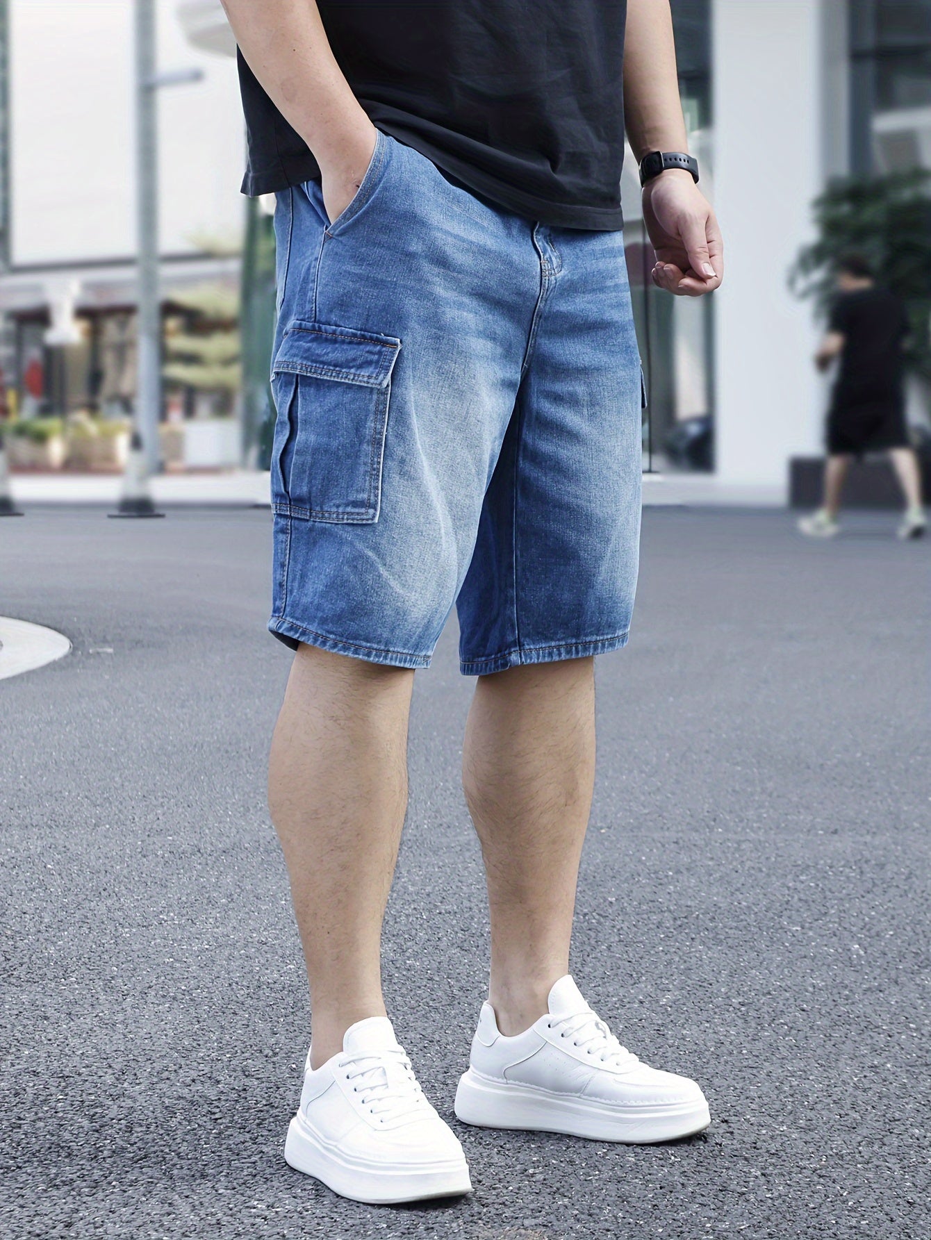 Men's plus size light blue denim shorts with casual fit, pockets, and classic style for casual attire.