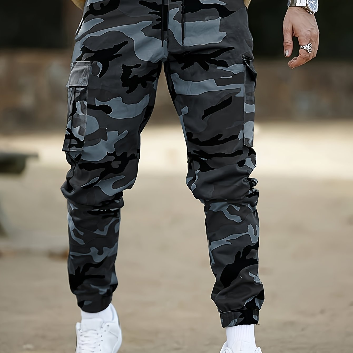 Camouflage cargo pants for men, ideal for outdoor activities in spring and autumn.