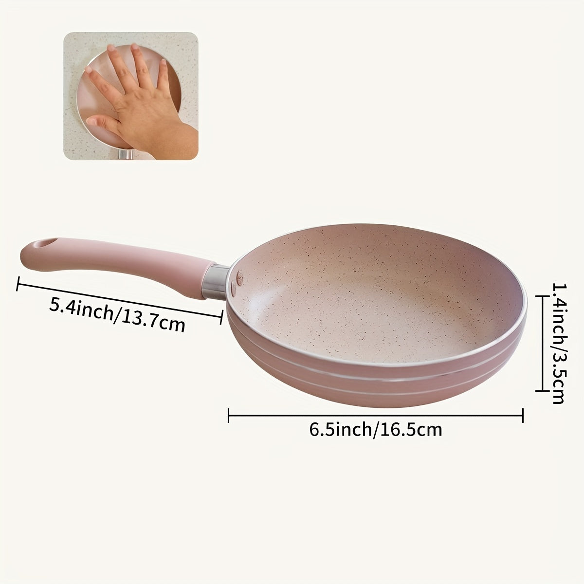 Pink aluminum mini frying pan with a flat bottom and silicone handle, measuring 16.51cm in size. Lightweight and suitable for frying eggs and steaks on a gas stove.