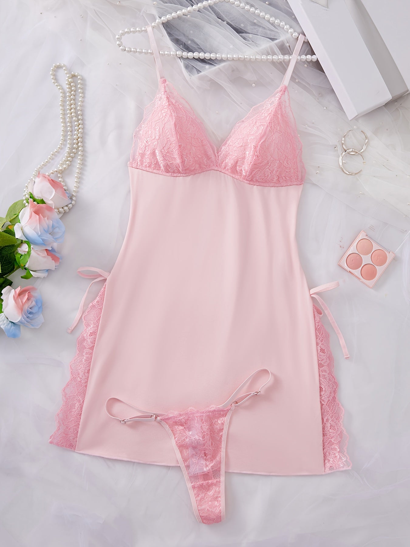 Women's sexy nightdress and panty set with V-neck, thin shoulder straps, and fashionable charm design.