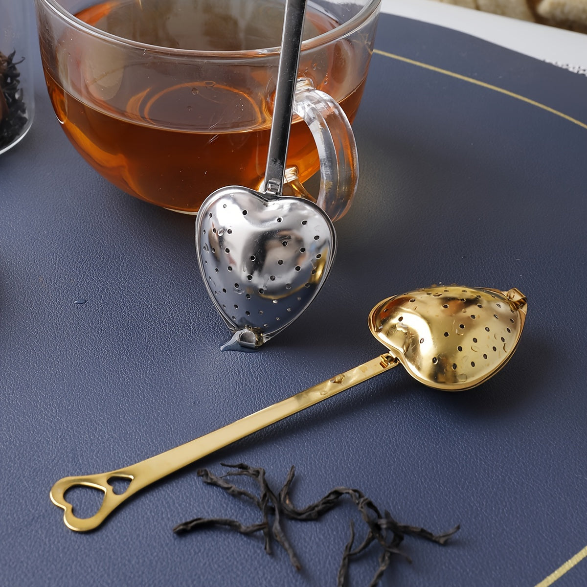 Heart-shaped tea infuser made of stainless steel, perfect for loose leaf tea, spices, and seasonings. An ideal kitchen accessory for home or office, and a great gift for Christmas or Halloween. Can also be used as a tea ball or other tea accessories.