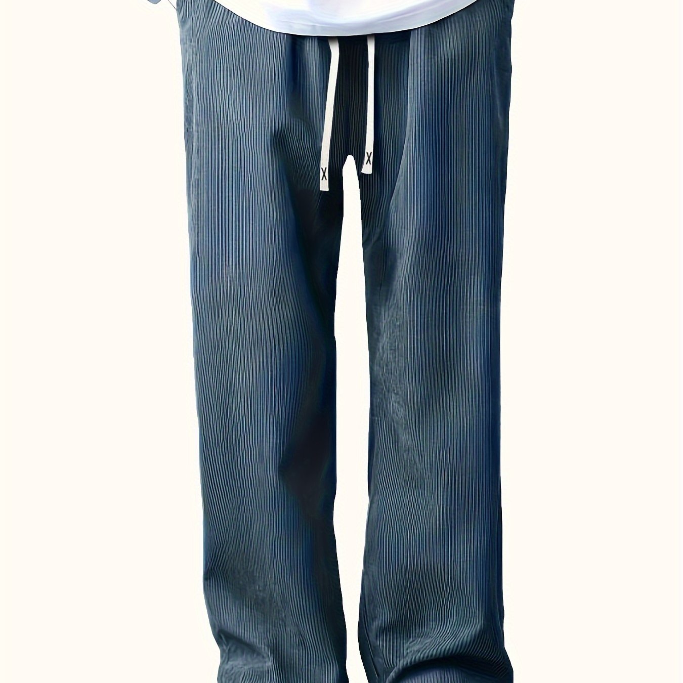 Loose straight-leg corduroy sweatpants in solid color, made of polyester blend with pockets and non-stretch fabric.