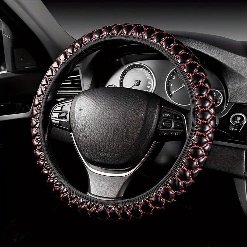 Luxurious embroidered faux leather steering wheel covers with anti-slip grip, universal fit. Comfortable and durable accessory for your vehicle.