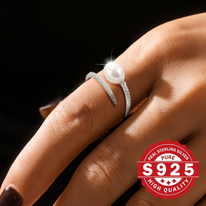 This elegant freshwater pearl ring for women is crafted from S925 sterling silver and adorned with artificial zirconia and freshwater pearls. Its stylish clash design makes it a unique gift option for festivals. Suitable for all occasions, this