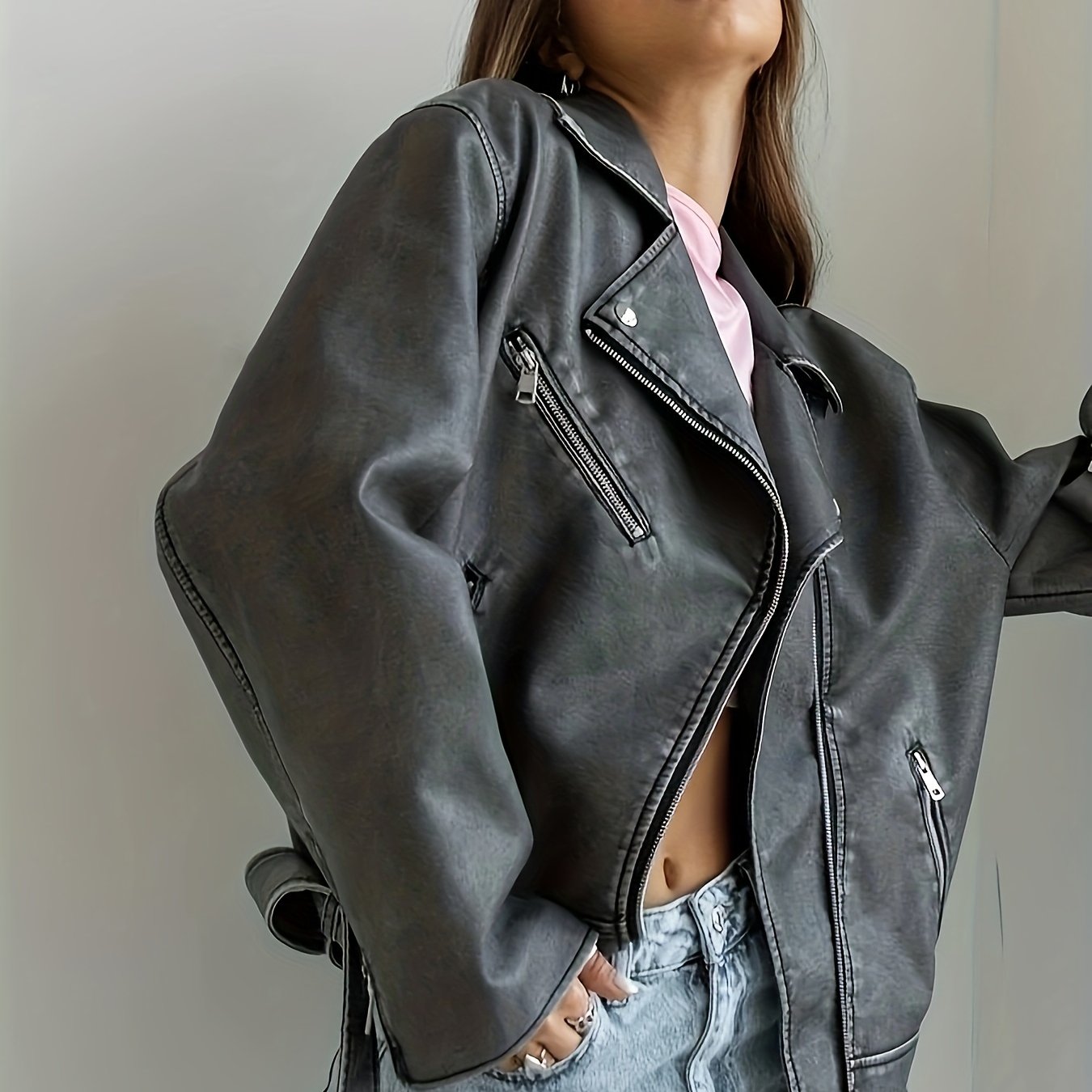 Women's Vintage Biker Jacket with Belted Lapel and Slant Zipper Pockets.