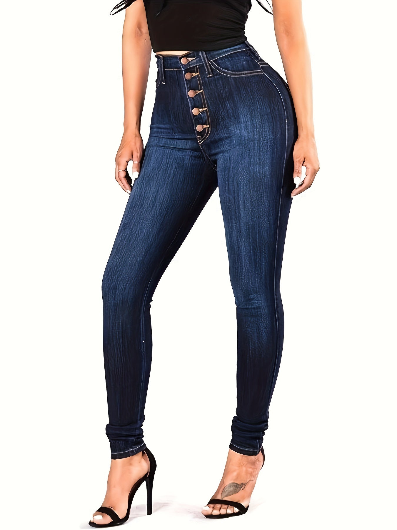 High-waist skinny jeans for women with curve-enhancing fit, button detail, solid color and cotton blend denim suitable for all seasons.