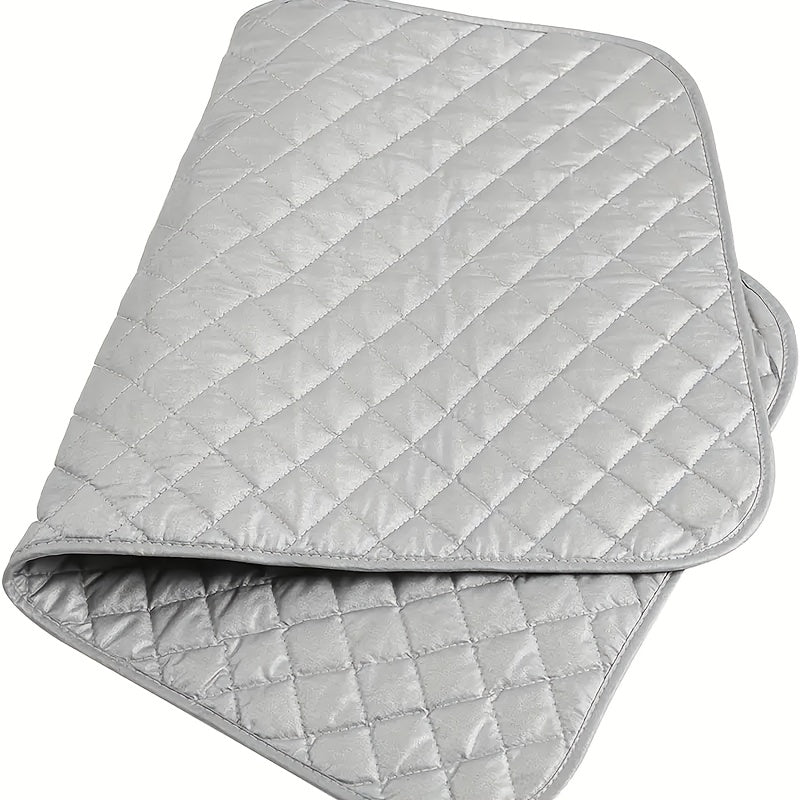 Portable and lightweight Heat-Resistant Quilted Ironing Pad Mat, measuring 45.72x83.82 cm. This non-electric ironing pad is compact and space-efficient, making it ideal for home and travel. Fits washer and dryer for added convenience, offering the