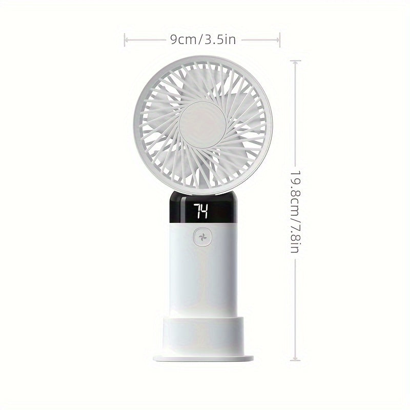 Portable handheld/desktop mini fan with adjustable angle, featuring 3 speeds, a digital display, long-lasting battery, dual-use standing and handheld design, USB charging, low-noise operation, and compact size ideal for office desk, bedside, or outdoor