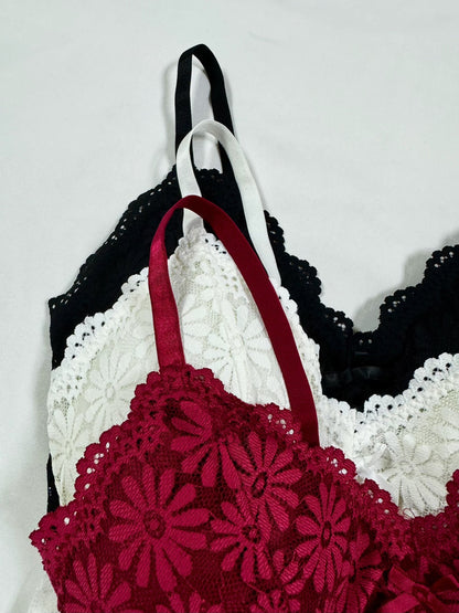 Sexy maroon lingerie set includes bra and matching panties with floral lace design and intricate pattern. Nylon/elastane blend, machine washable. Ideal for teens and special occasions.