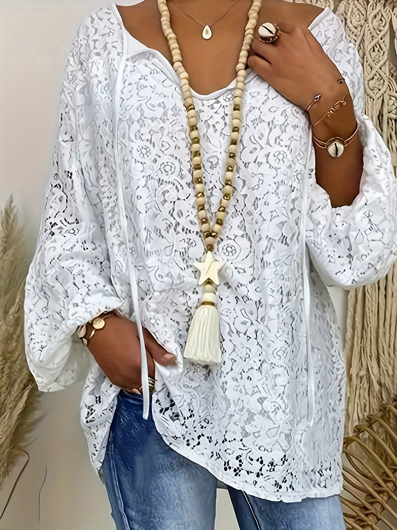 Elegant plus size white lace V-neck top with long sleeves, loose fit knit for autumn.