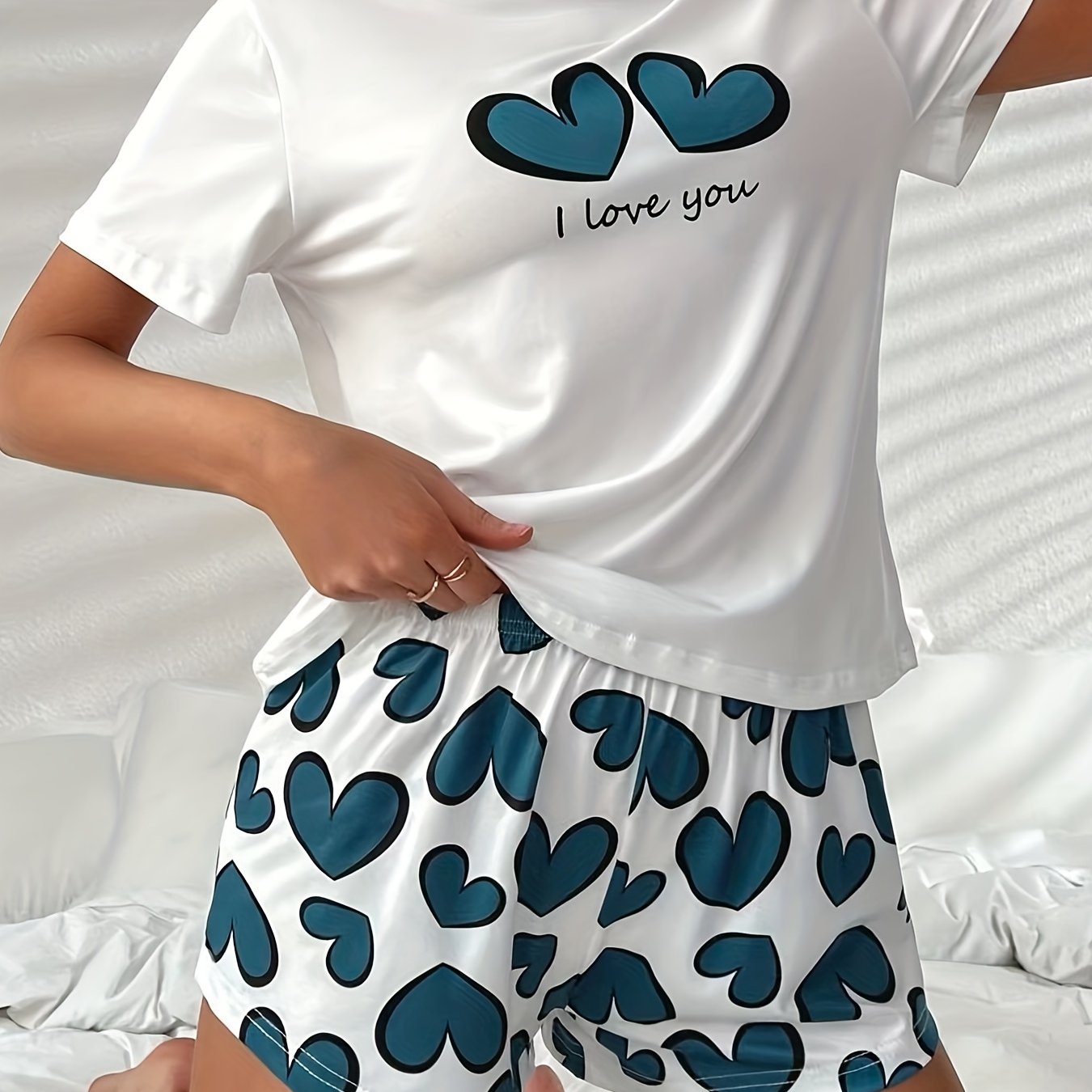 Women's Heart Print Pajama Set with Crew Neck Top and Elastic Waistband Shorts for Sleepwear and Loungewear.