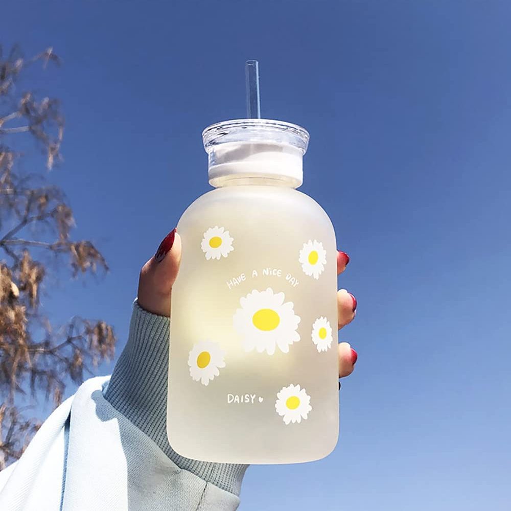 1 Matte glass water bottle with straw and scale, featuring a cute daisy sunflower design. Portable, convenient, perfect for back to school supplies.