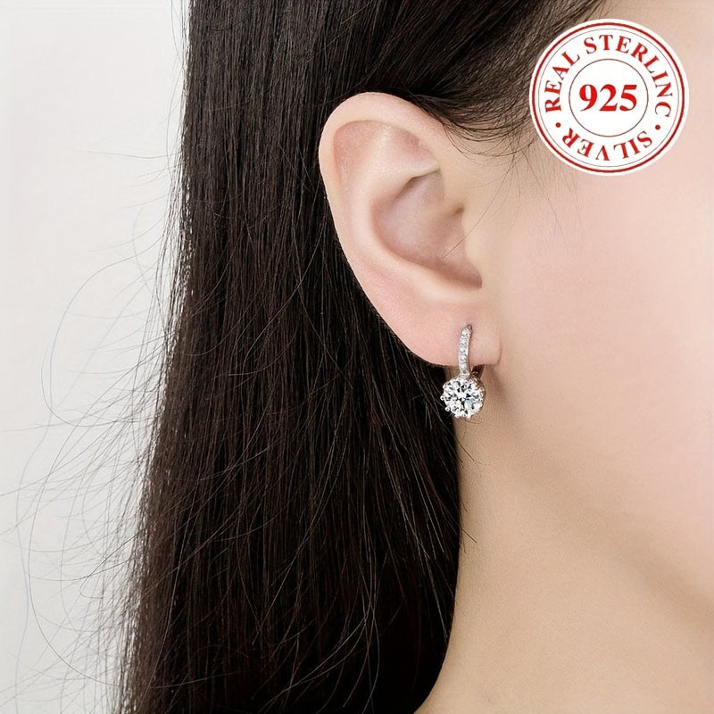 These stunning round zirconia earrings are crafted from hypoallergenic S925 silver, making them perfect for women with sensitive skin. They make a beautiful Valentine's Day engagement gift, weighing in at 3.52g (0.124oz).