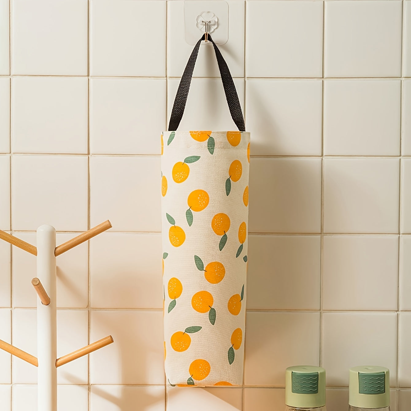 Organize your kitchen with our wall-mounted garbage bag holder - the perfect space-saving solution for keeping plastic bags and other items tidy and accessible.