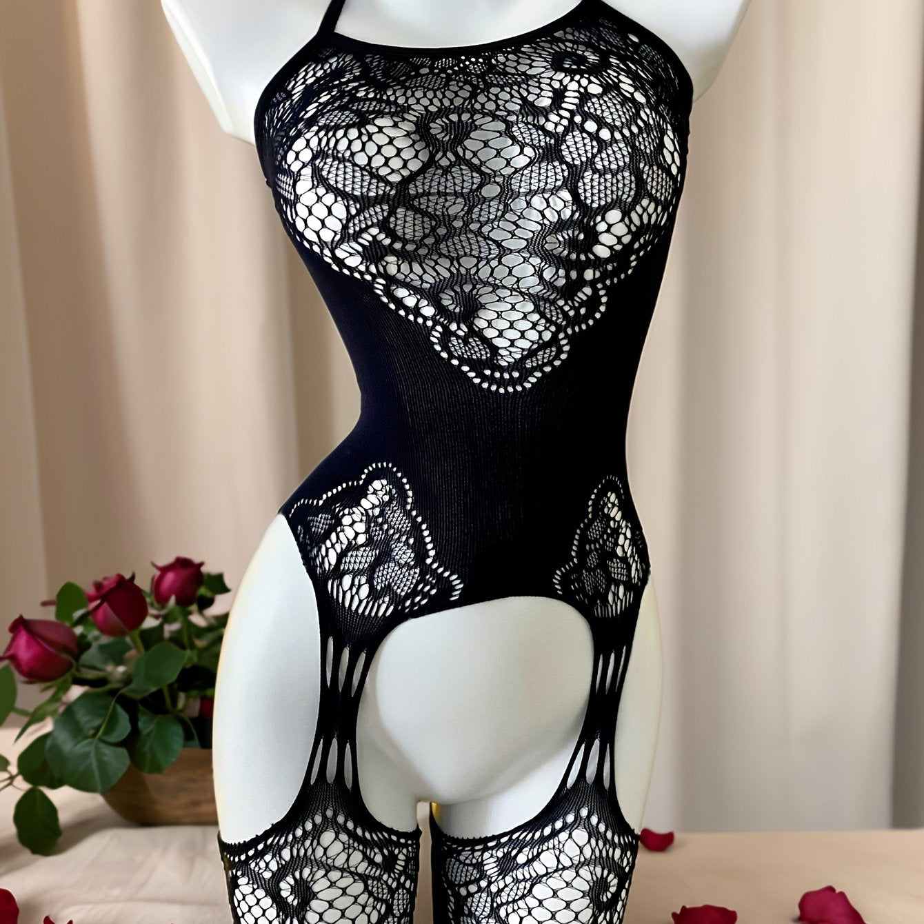 Stylish navy blue lace bodysuit with open crotch design, ideal for Valentine's Day and beachwear, made of sheer nylon/elastane blend, hand wash only.