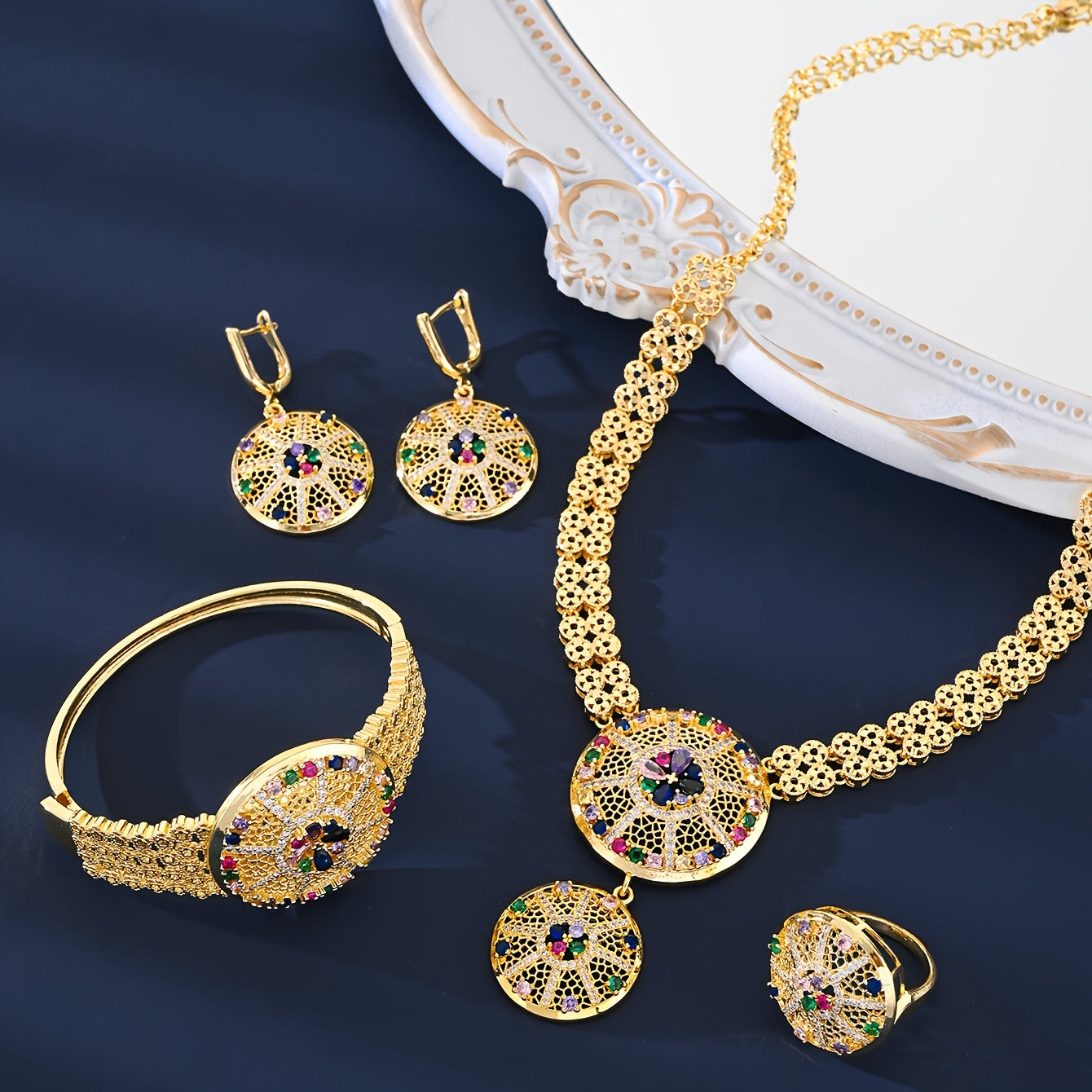 Exquisite 4-Piece Jewelry Set with an Arabian Vintage Touch - Crafted from 18K Gold-Plated Copper adorned with Vibrant Zirconia Stones. Set includes Ring, Earrings, Necklace, and Bracelet - Ideal for Wedding and Festive Occasions