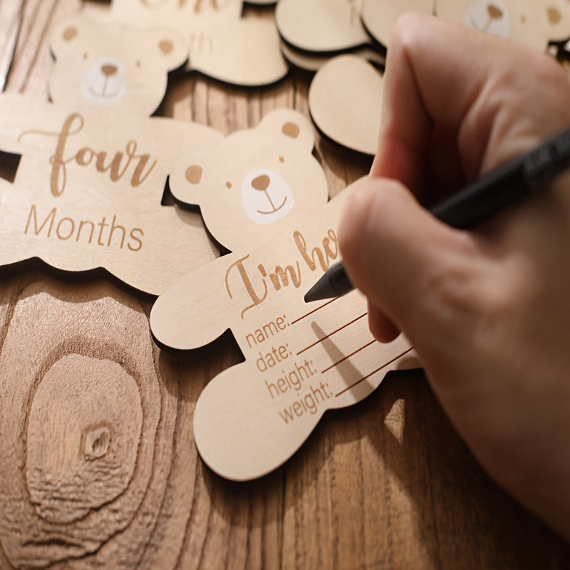 Wooden birthday lettering, growth milestone cards, sweet bear accents, wooden milestone cards, adorable photo props, baby's first birthday celebration.