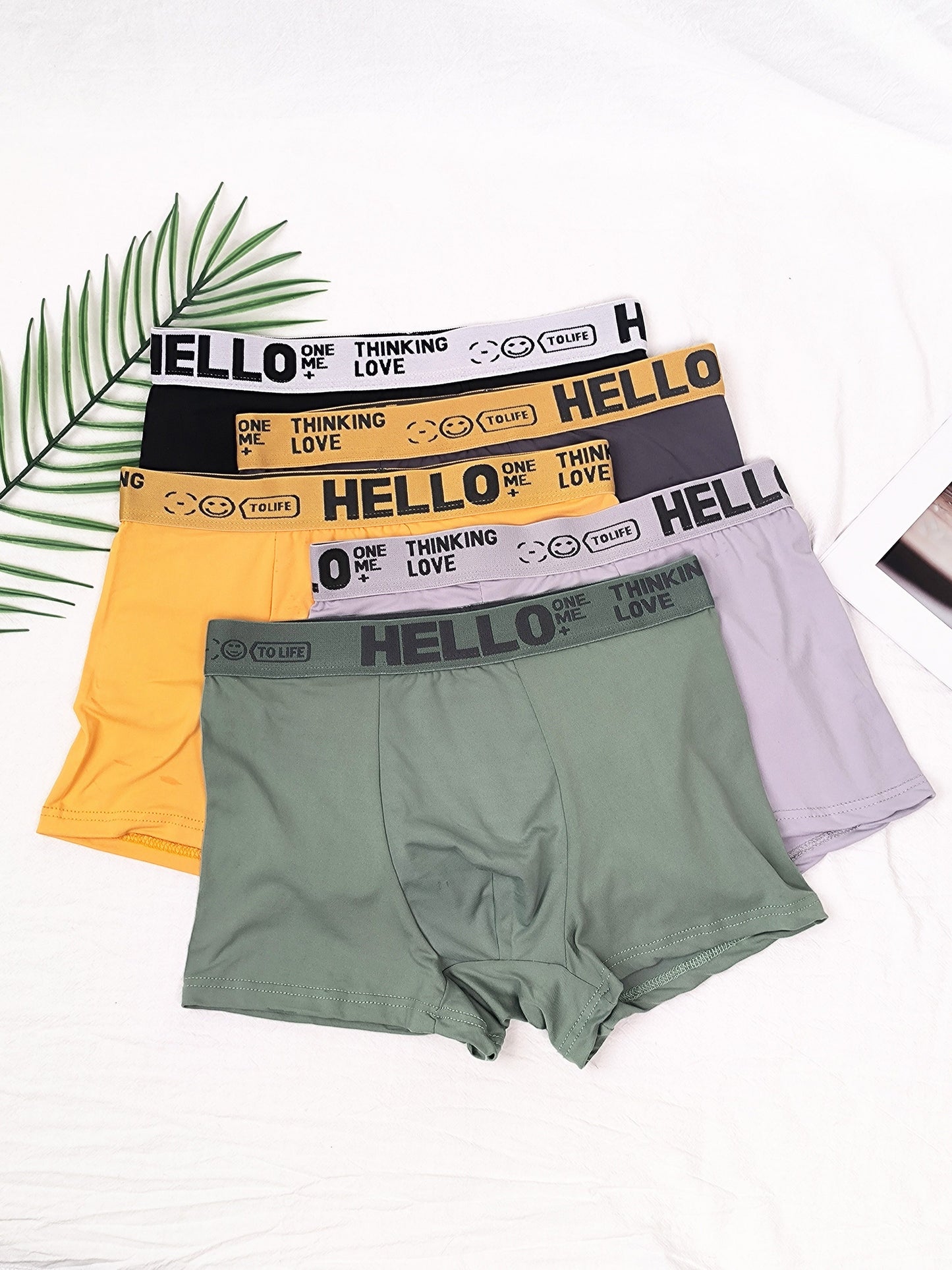 Men's 6-pack boxer briefs with "Hello" print, made of breathable polyester with high elasticity and quick-dry technology. Comfortable fit for daily wear with knit fabric and 95% polyester