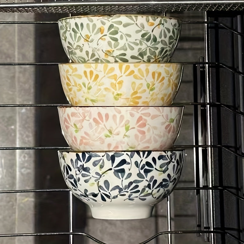 Set of 4 ceramic bowls with floral patterns, versatile for various dishes, safe for dishwasher, oven, and microwave.