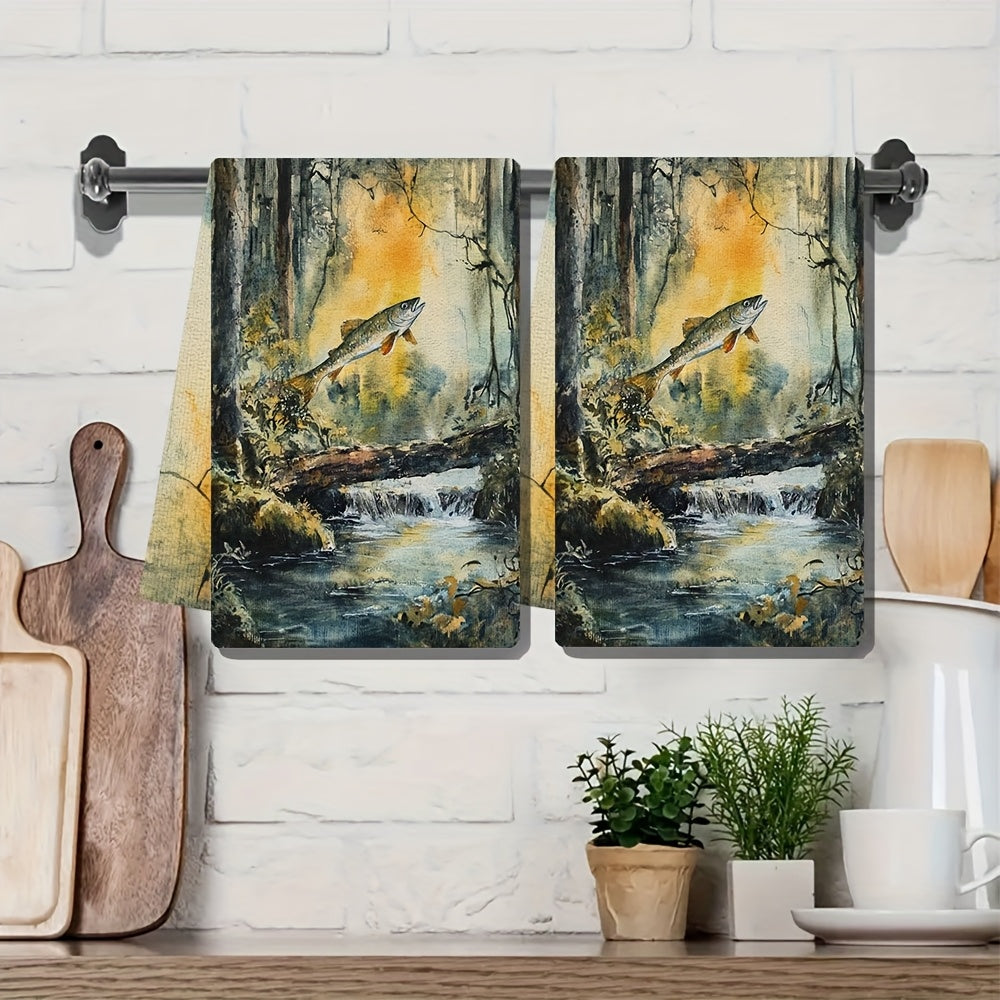 Two pieces of ultra soft kitchen towels featuring a serene forest stream and salmon jump design. These highly absorbent towels are machine washable and perfect for drying dishes or hands. With a contemporary style, each towel measures 40.64x60.96 cm.